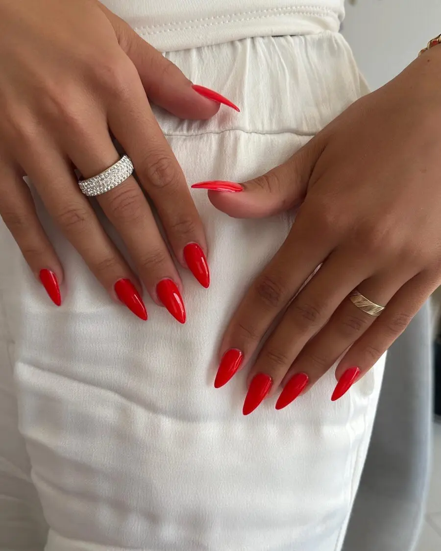 Bold red stiletto nails for confident women