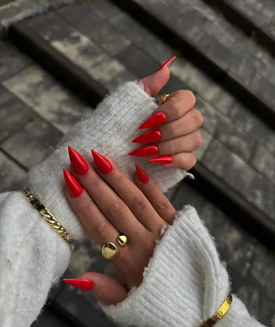 Vibrant red stiletto nails for a bold look
