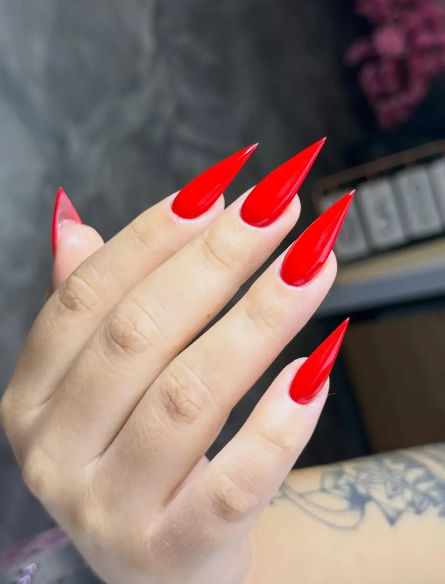 Bold Red Stiletto Nails for a Daring Look
