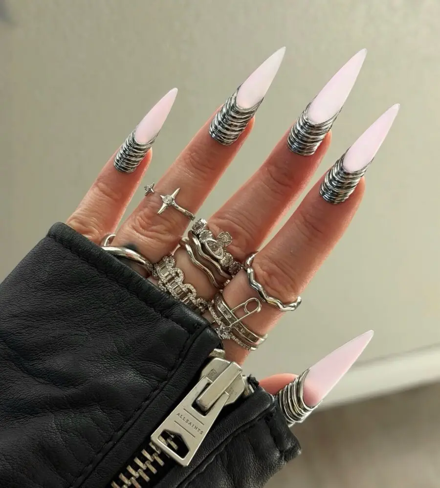 Glamorous stiletto nails with silver accents
