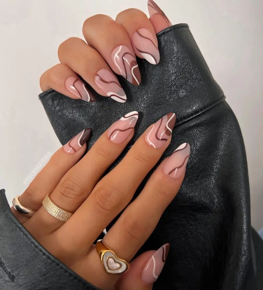 Chic stiletto nails with trendy swirls