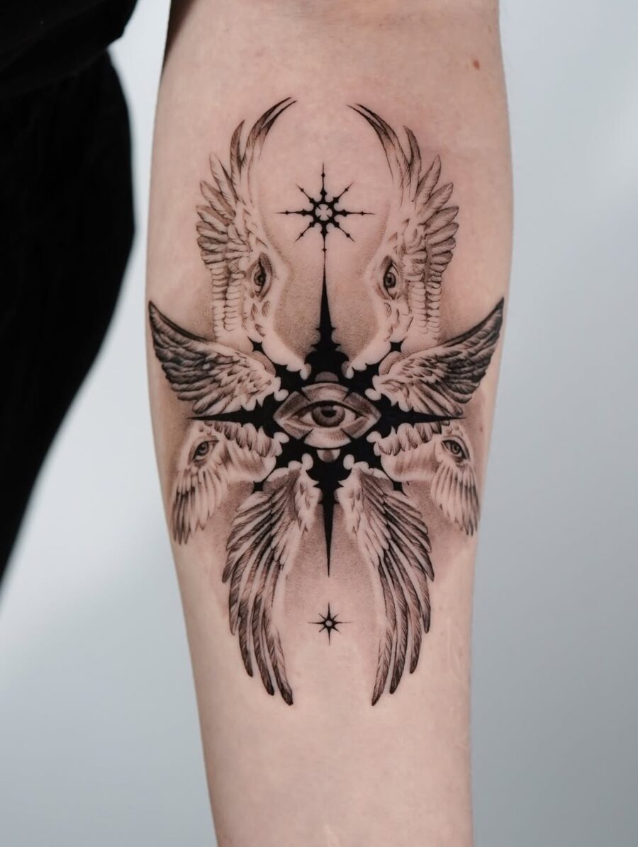Intricate blackwork tattoo with spiritual symbolism