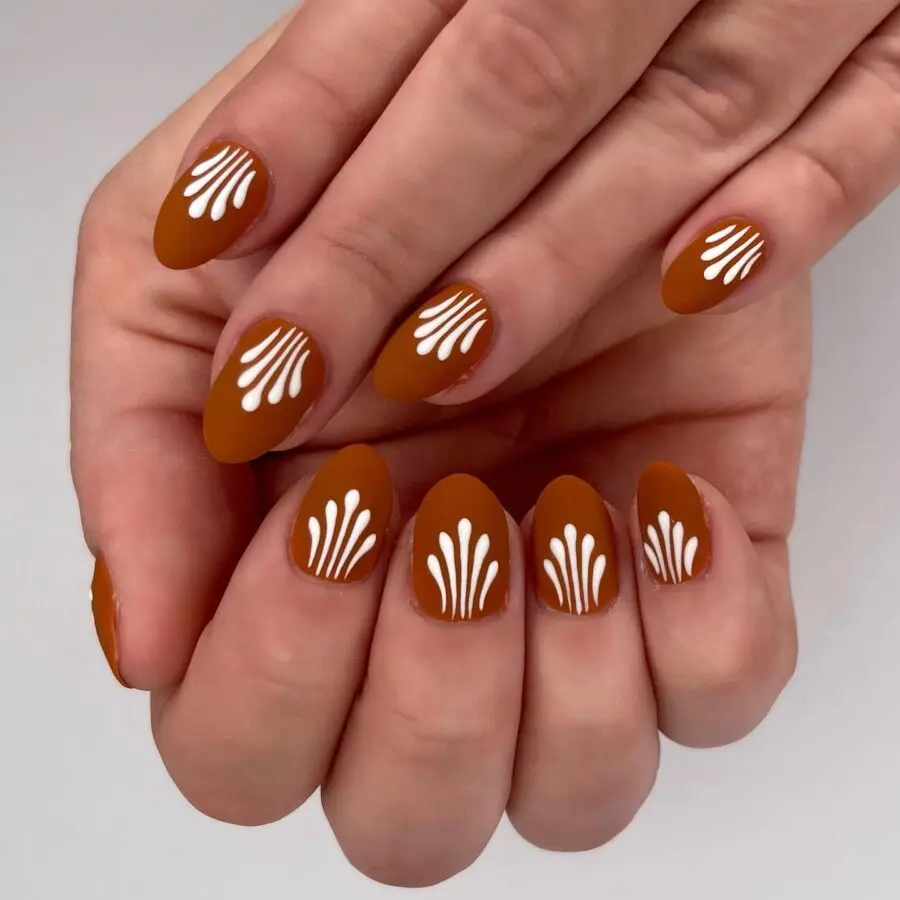 Elegant brown and white Thanksgiving nail art