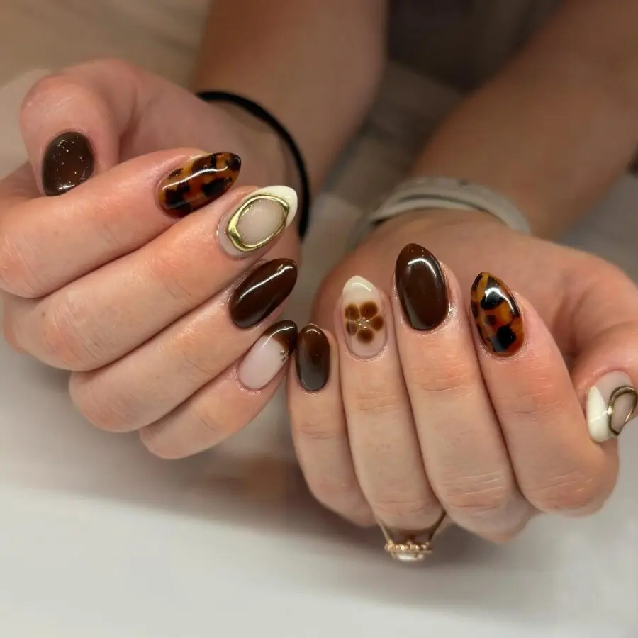 Elegant brown and tortoise Thanksgiving nail art