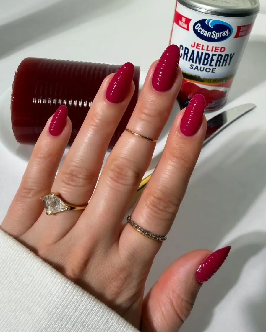 Glistening burgundy nails capture Thanksgiving spirit