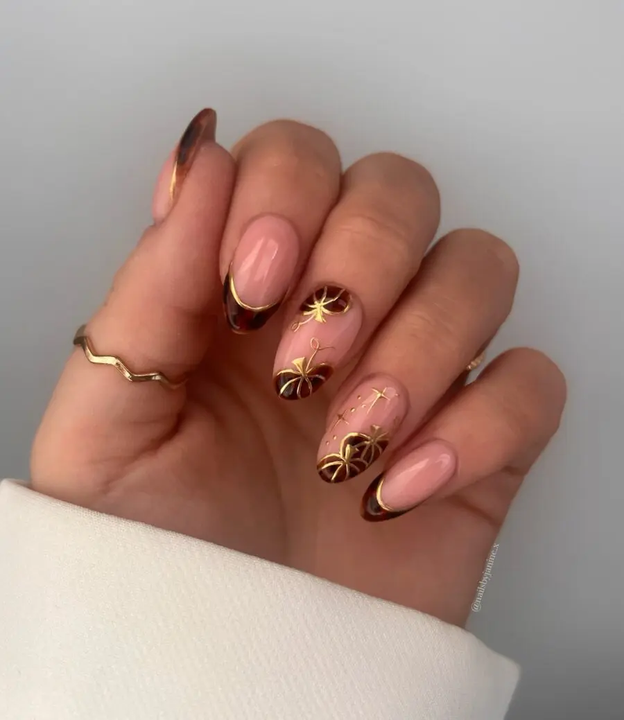 Elegant gold leaf fall nail design