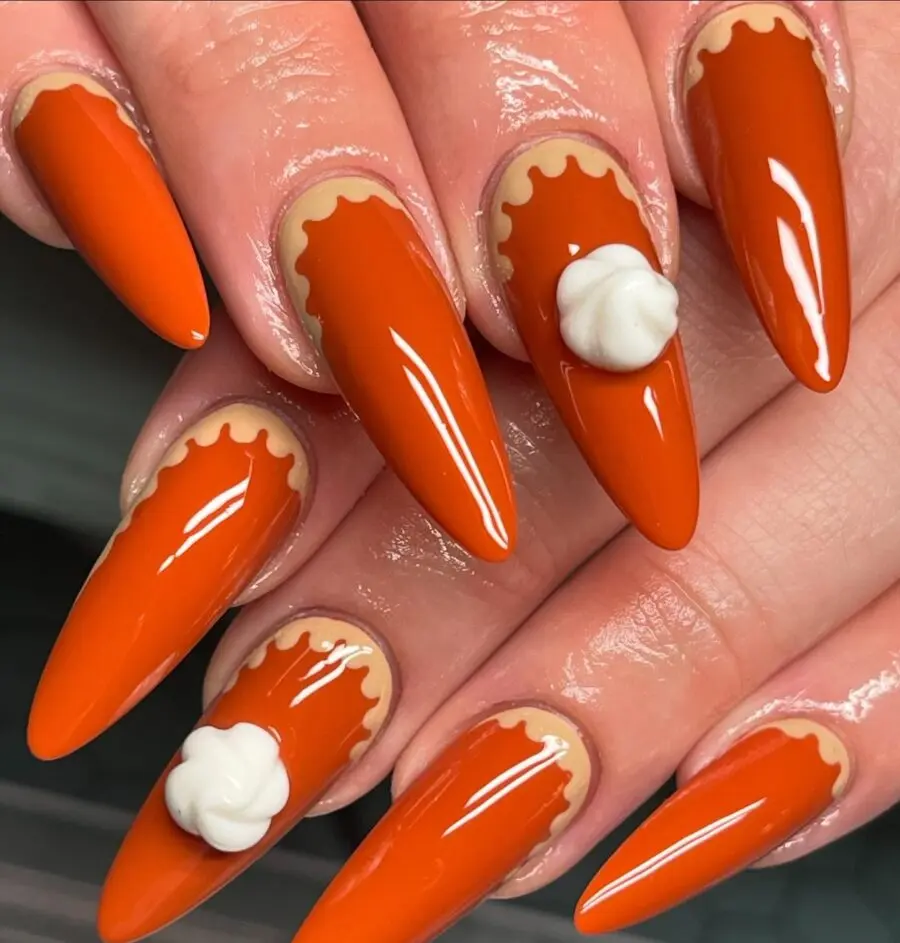 Festive nails inspired by pumpkin pie design