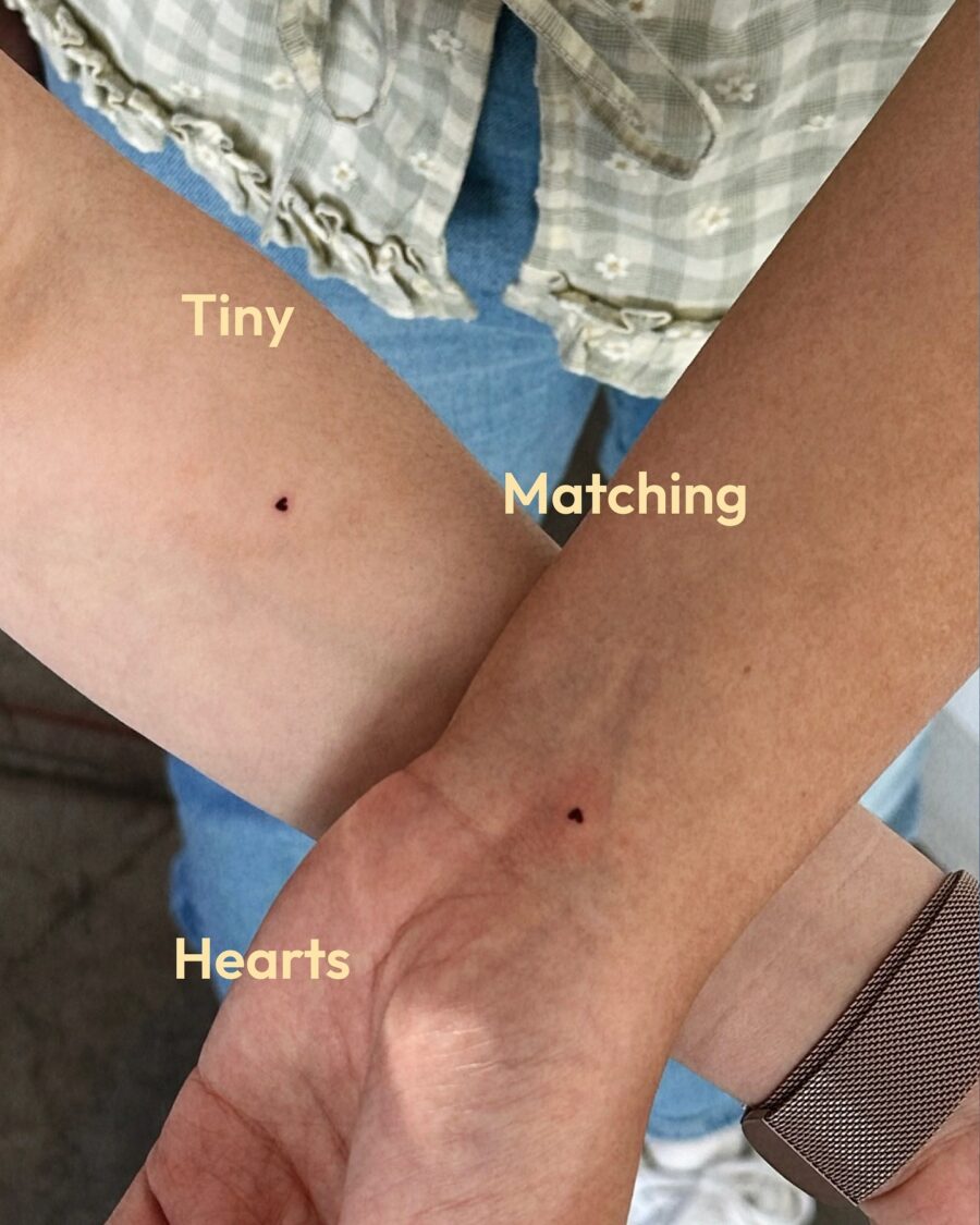 Delicate matching heart tattoos for friends