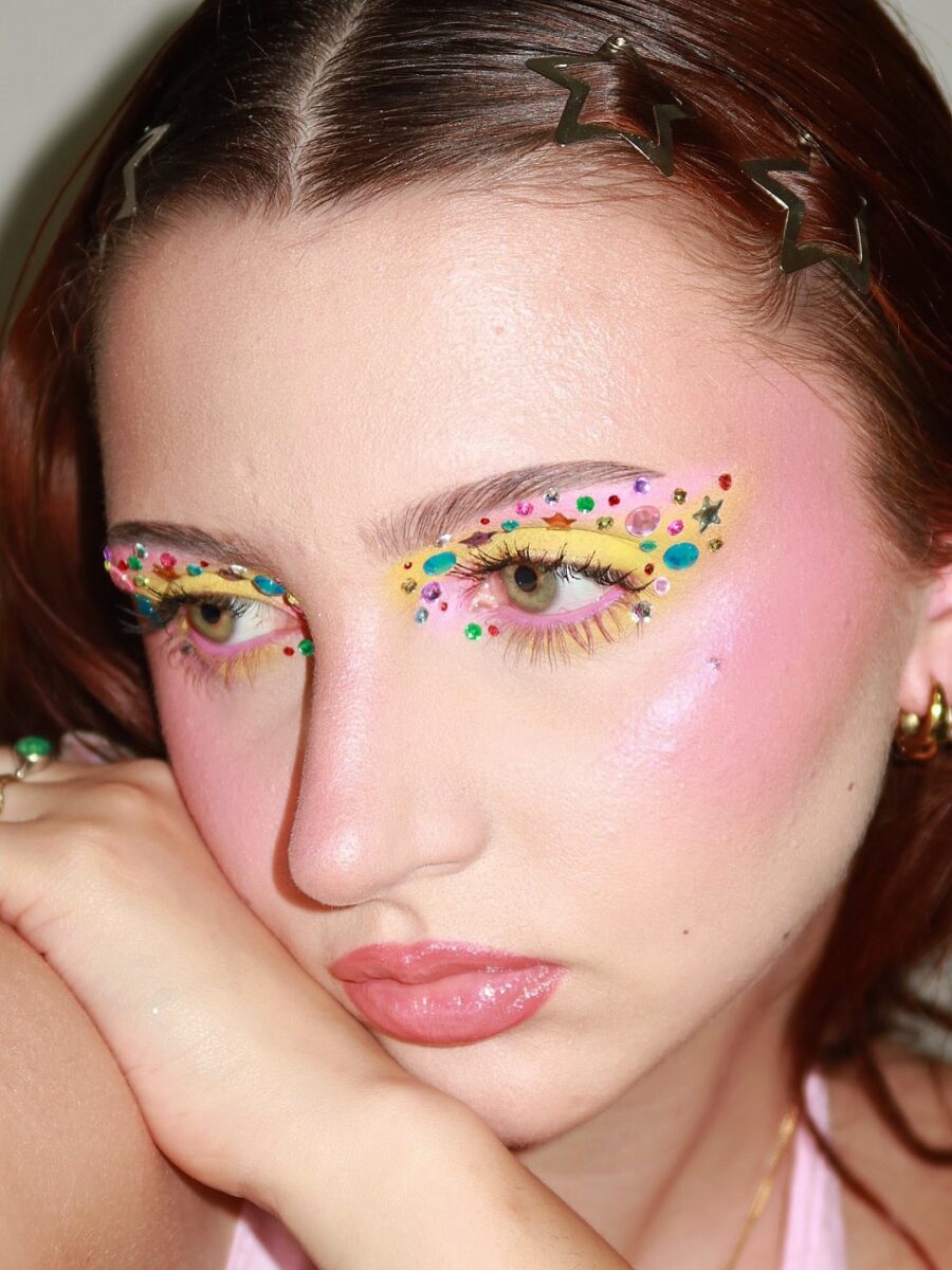 Vibrant Y2K-inspired makeup with colorful accents