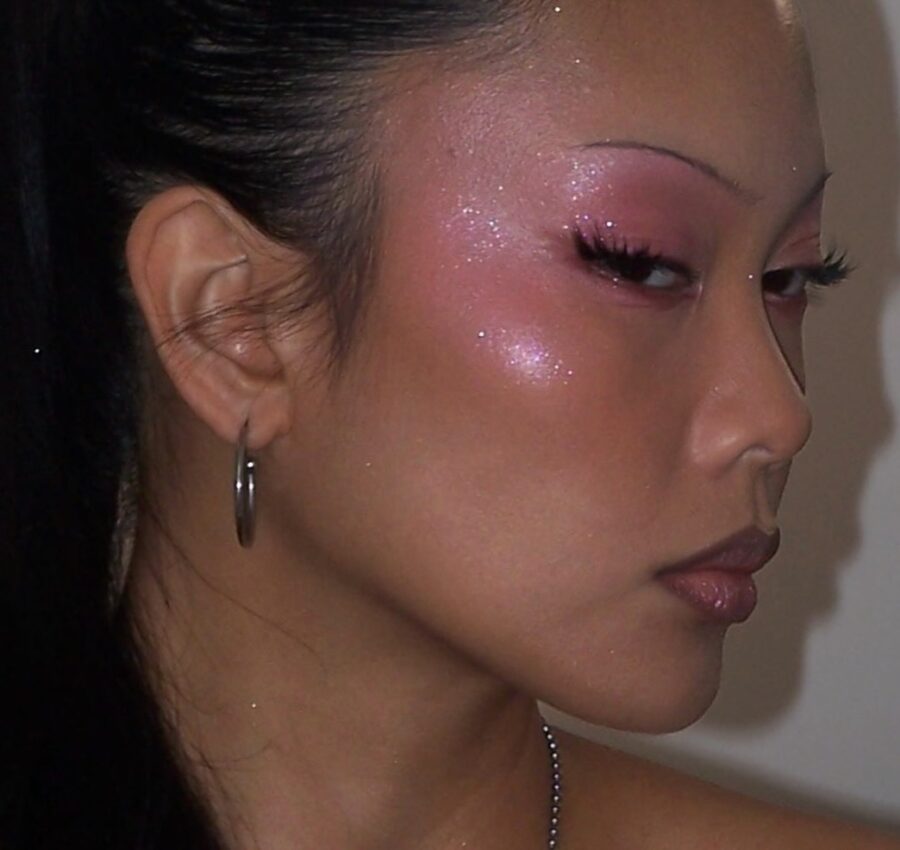 Glittery pink Y2K-inspired makeup vibes.