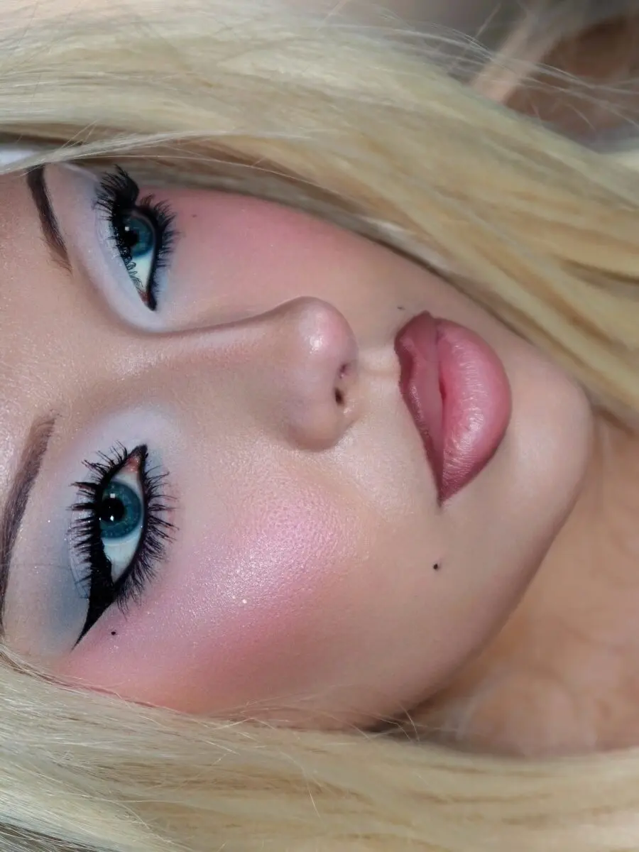 Vibrant Y2K makeup with bold features