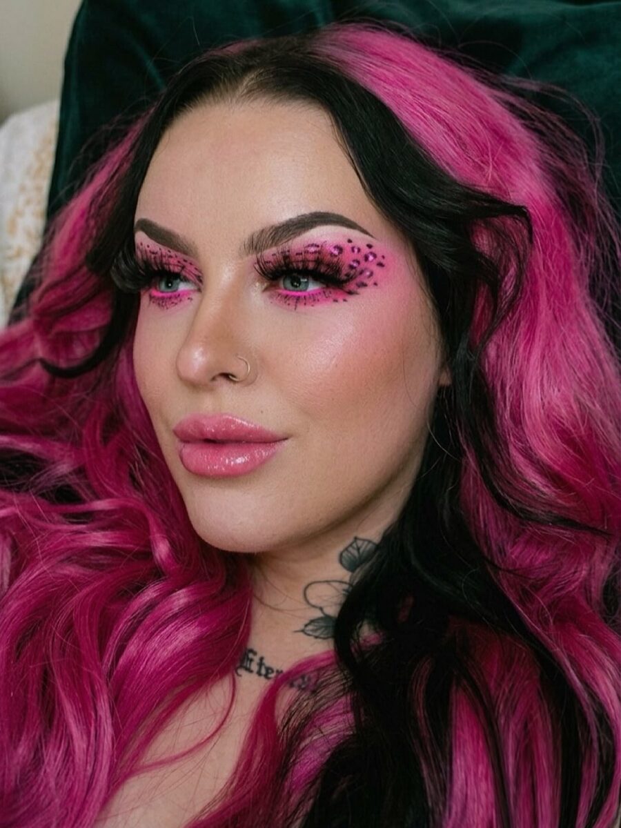 Bold y2k makeup with pink leopard details