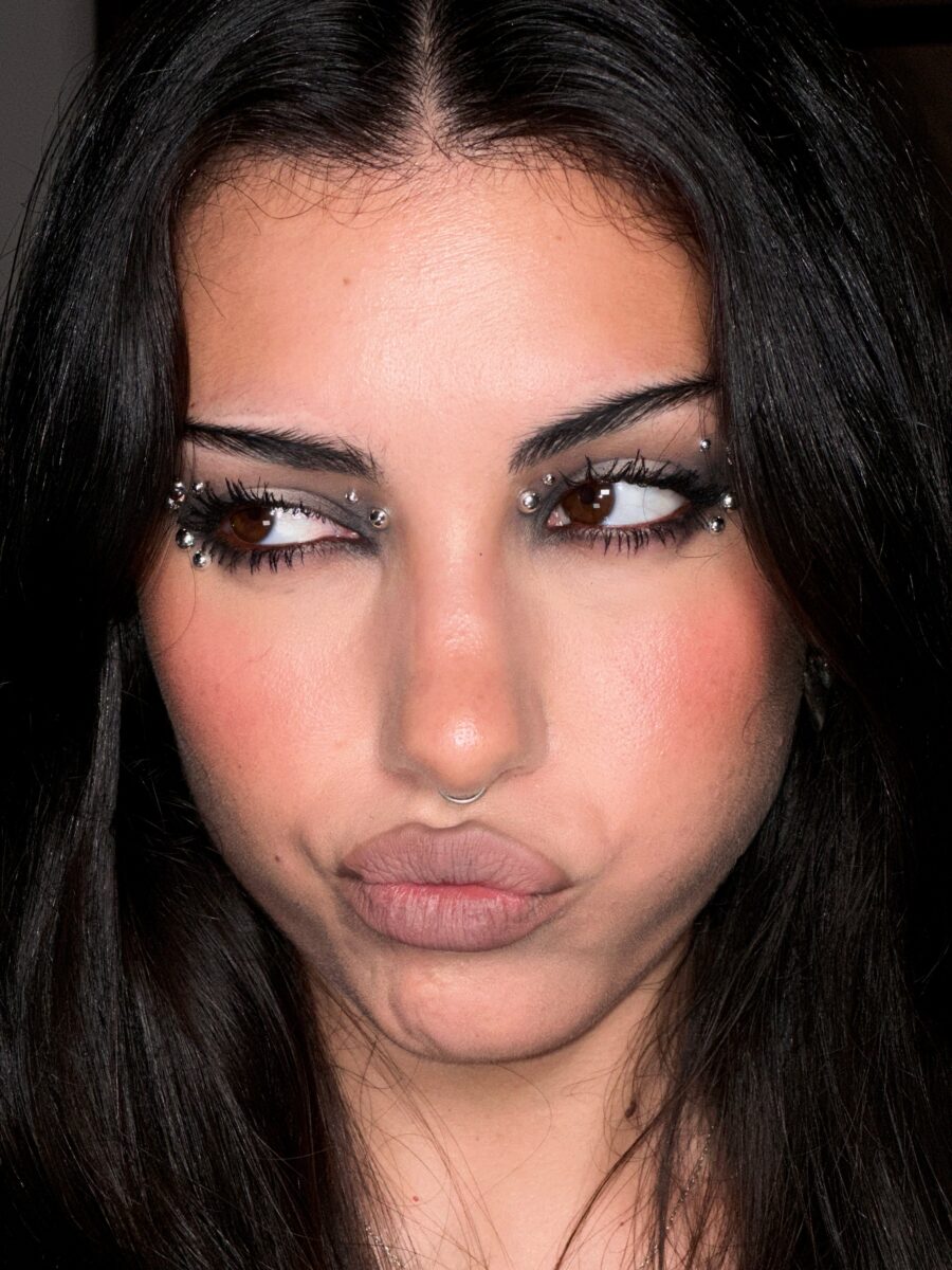 Edgy y2k makeup with rhinestone accents