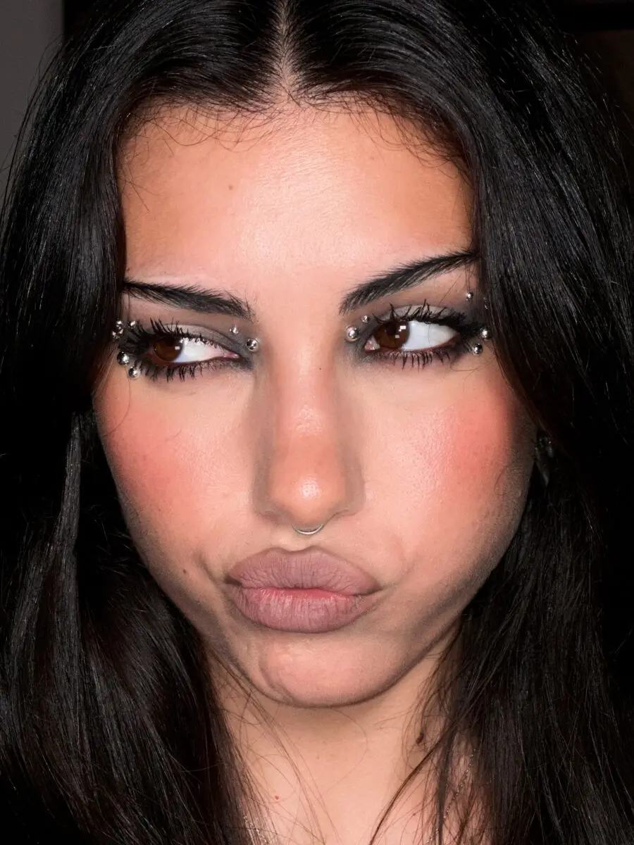 Edgy y2k makeup with rhinestone accents